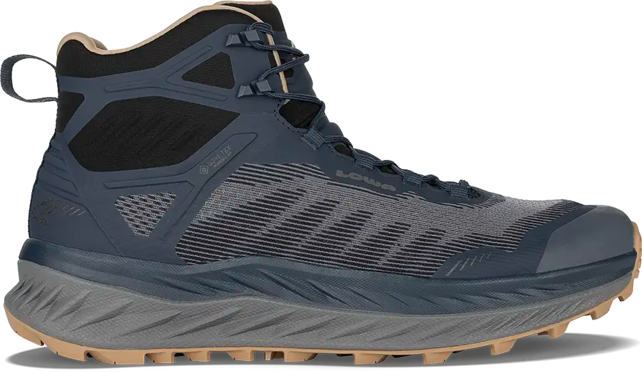 Navy and dune trail running/speed hiking boot with a textured sole on a white background