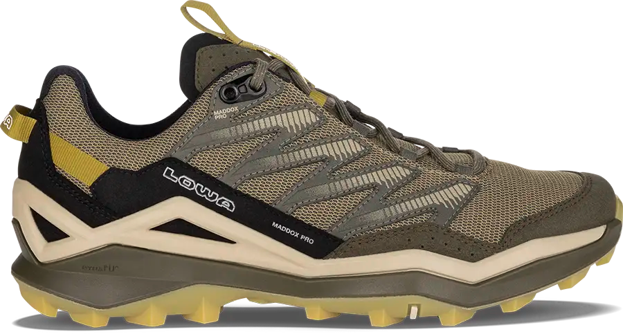 Light hiking shoe with black and olive accents on a white background