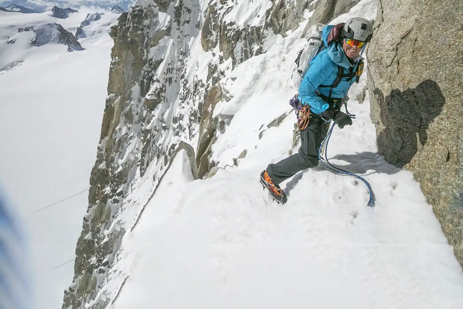 LOWA Ambassador, Sunny Stroeer, mountaineering on snowy ledge