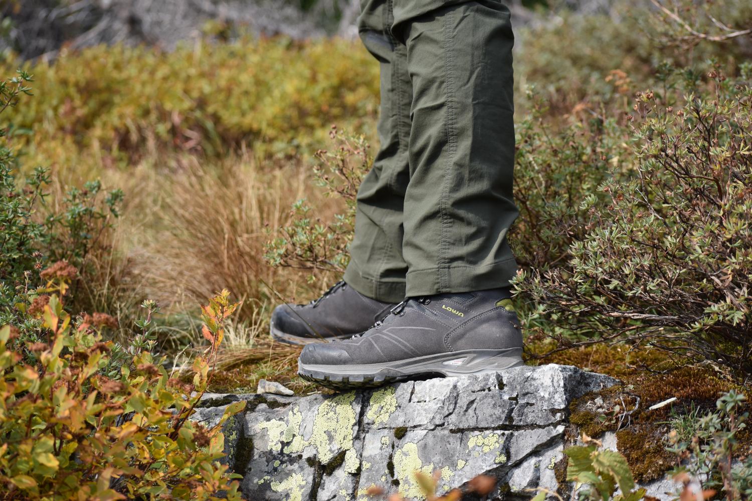 The LOWA Baldo hiking boot shown outside on a hiking trail. 